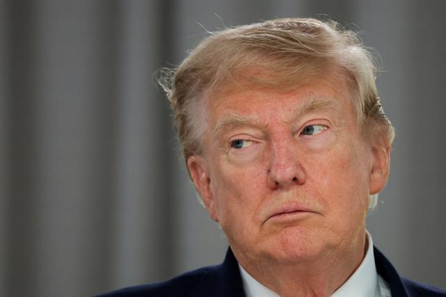 US President Donald Trump attends a work lunch as part of the G7 summit, in Evian, eastern France, on June 16, 2026. A G7 summit is set to take place June 15 to 17 in the French town of Evian-les-Bains near Switzerland and it will be attended by country leaders as well as the EU's foreign policy chief and ministers from Brazil, Canada, the United Arab Emirates and Turkey. (Photo by Christian Hartmann / POOL / AFP)