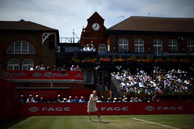 France's Adrian Mannarino returns against Czech Republic's Jakub Mensik during their men's singles round of 32 tennis match on day two of the ATP HSBC Championships at Queen's Club in west London on June 16, 2026. (Photo by Henry NICHOLLS / AFP)