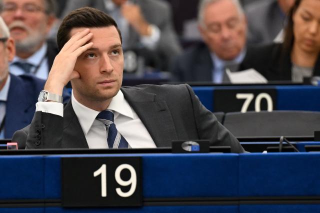 French far-right Rassemblement National (RN) party's President, Member of the European Parliament and president of the Patriots for Europe group Jordan Bardella (C) reacts during a plenary session at the European Parliament in Strasbourg on June 16, 2026. (Photo by Jean-Christophe VERHAEGEN / AFP)