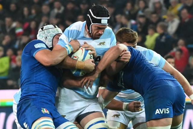 (FILES) Argentina's lock Matias Alemanno is tackled by Italian players during the Autumn Nations Series International rugby union Test match between Italy and Argentina at The Friuli Stadium in Udine on November 9, 2024. Vannes have signed Argentina lock Matias Alemanno on a two-year deal, the newly-promoted French Top 14 club announced on June 16, 2026. Alemanno arrives from Gloucester after spending six years with the English side, the 34-year-old has made 99 appearances for the Pumas and has featured at three Rugby World Cups. (Photo by MARCO SABADIN / AFP)