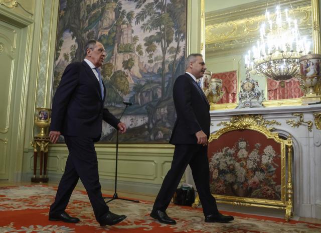 Russian Foreign Minister Sergei Lavrov and his Turkish counterpart Hakan Fidan leave a joint press conference following their meeting in Moscow on June 16, 2026. (Photo by SERGEI ILNITSKY / POOL / AFP)