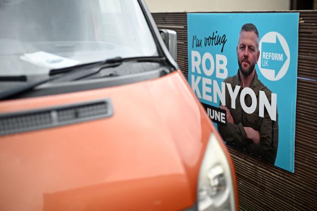 A poster for Reform UK's candidate, Rob Kenyon, is pictured in Makerfield, north-west England on June 16, 2026, ahead of the forthcoming by-election on June 18. Britain holds a special vote on June 18 that is expected to set in motion an attempt to oust Labour leader Keir Starmer as prime minister. (Photo by Oli SCARFF / AFP)