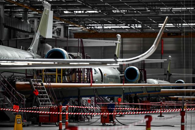 This photograph shows Falcon 6X business aircrafts on an assembly line at the Dassault Aviation plant in Merignac, southwestern France on June 16, 2026. (Photo by Christophe ARCHAMBAULT / AFP)