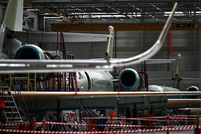 This photograph shows Falcon 6X business aircrafts on an assembly line at the Dassault Aviation plant in Merignac, southwestern France on June 16, 2026. (Photo by Christophe ARCHAMBAULT / AFP)