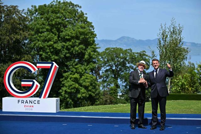 France's President Emmanuel Macron welcomes Brazil's President Luiz Inacio Lula da Silva for the official greeting during the G7 summit, in Evian, eastern France, on June 16, 2026. A G7 summit is set to take place June 15 to 17 in the French town of Evian-les-Bains near Switzerland and it will be attended by country leaders as well as the EU's foreign policy chief and ministers from Brazil, Canada, the United Arab Emirates and Turkey. (Photo by Mandel NGAN / AFP)