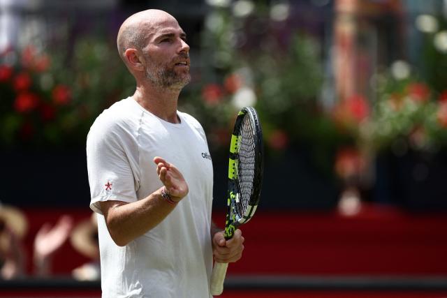 France's Adrian Mannarino celebrates winning against Czech Republic's Jakub Mensik during their men's singles round of 32 tennis match on day two of the ATP HSBC Championships at Queen's Club in west London on June 16, 2026. (Photo by Henry Nicholls / AFP)