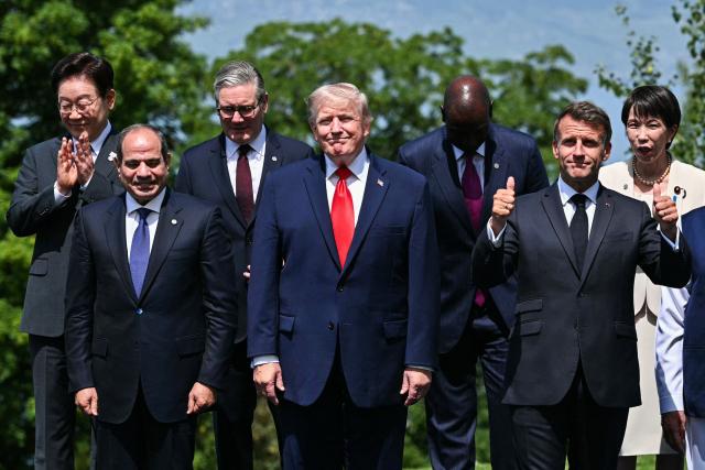 (From L) South Korea's President Lee Jae-myung, Egypt's President Abdel Fattah El-Sisi, Britain's Prime Minister Keir Starmer, US President Donald Trump, Kenya's President William Ruto, France's President Emmanuel Macron and Japan's Prime Minister Sanae Takaichi pose for a family photograph during the G7 summit, in Evian, eastern France, on June 16, 2026. A G7 summit is set to take place June 15 to 17 in the French town of Evian-les-Bains near Switzerland and it will be attended by country leaders as well as the EU's foreign policy chief and ministers from Brazil, Canada, the United Arab Emirates and Turkey. (Photo by Mandel NGAN / AFP)