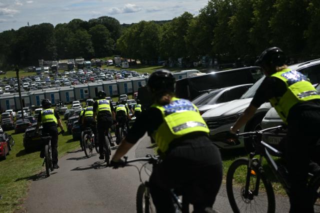 Police officers on bicycles patrol a car park on the first day of the Royal Ascot horse racing meeting in Ascot, west of London, on June 16, 2026. (Photo by JUSTIN TALLIS / AFP)
