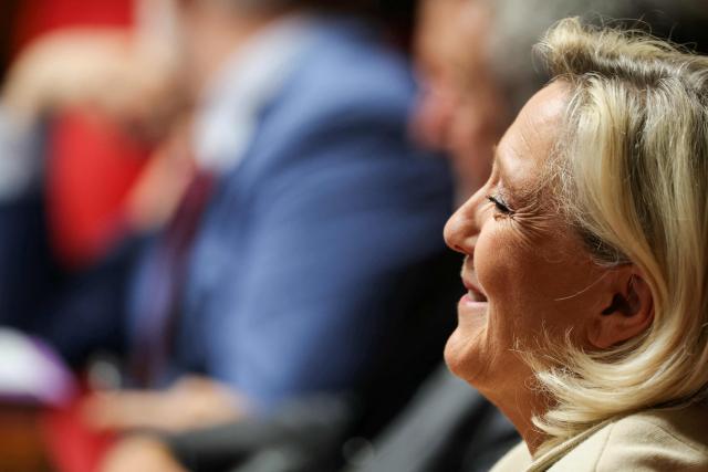 President of Rassemblement National parliamentary group Marine Le Pen reacts during a session of questions to the government at The National Assembly, France's lower house of parliament in Paris on June 16, 2026. (Photo by Thomas SAMSON / AFP)