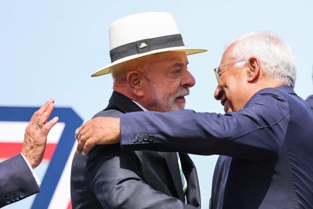 Brazil's President Luiz Inacio Lula da Silva greets European Council President Antonio Costa during a family photograph as part of the G7 summit, in Evian, eastern France, on June 16, 2026. A G7 summit is set to take place June 15 to 17 in the French town of Evian-les-Bains near Switzerland and it will be attended by country leaders as well as the EU's foreign policy chief and ministers from Brazil, Canada, the United Arab Emirates and Turkey. (Photo by Ludovic MARIN / POOL / AFP)