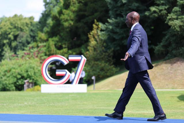 Kenya's President William Ruto arrives for the official greeting ahead of a work lunch as part of the G7 summit, in Evian, eastern France, on June 16, 2026. A G7 summit is set to take place June 15 to 17 in the French town of Evian-les-Bains near Switzerland and it will be attended by country leaders as well as the EU's foreign policy chief and ministers from Brazil, Canada, the United Arab Emirates and Turkey. (Photo by Ludovic MARIN / AFP)