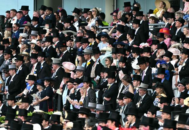 Racegoers wait for the start of the St James's Palace Stakes horse race on the first day of the Royal Ascot horse racing meeting in Ascot, west of London, on June 16, 2026. (Photo by JUSTIN TALLIS / AFP)