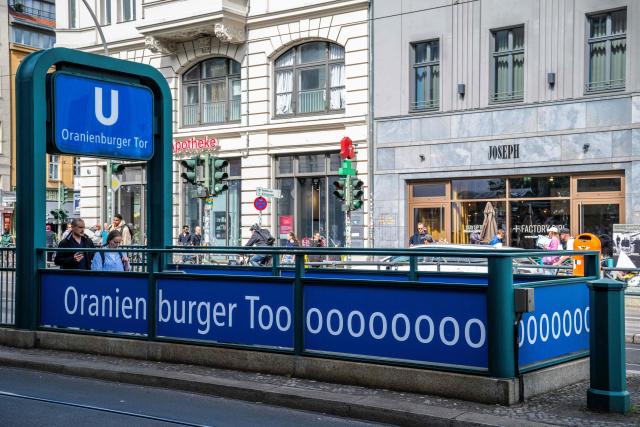 The Oranienburger Tor (Oranienburg Gate) underground station is decorated with a banner reading: "Oranienburger Toooooooor" with the word tor also meaning goal in German, in Berlin on June 16, 2026, after Germany played its first Football World Cup match. The banner campaign has involved every Berlin underground station that includes the word Tor in its name. (Photo by John MACDOUGALL / AFP)