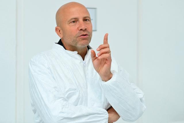 Director of Sanofi France and Managing Director Vaccines France Charles Wolf gestures during a press visit to the industrial site of the French pharmaceutical group Sanofi in Montpellier, southern France, on June 16, 2026. (Photo by Sylvain THOMAS / AFP)