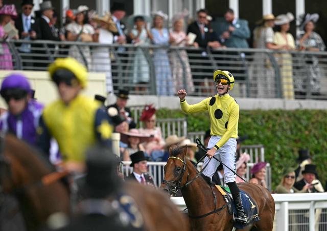 Jockey Billy Loughnane celebrates on Bow Echo (R) after winning the St James's Palace Stakes horse race on the first day of the Royal Ascot horse racing meeting in Ascot, west of London, on June 16, 2026. (Photo by JUSTIN TALLIS / AFP)