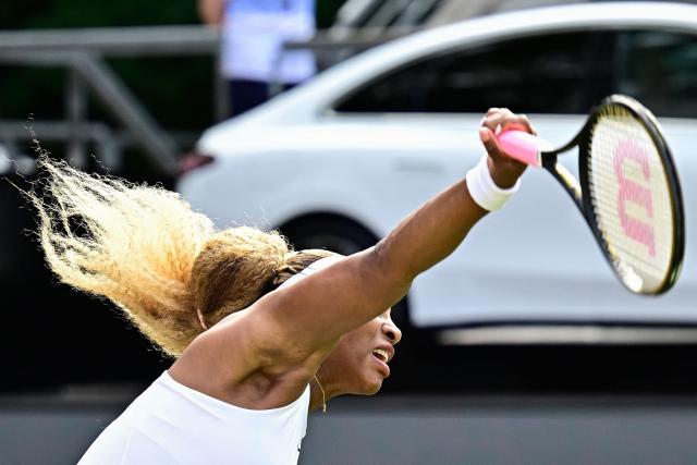 US tennis player Serena Williams serves the ball as she plays with Czech Republic's Karolina Muchova against New Zealand's Erin Routliffe and Mexico's Giuliana Olmos during the women's doubles round of 16 match at the WTA500 Berlin Tennis Open tournament in Berlin on June 16, 2026. (Photo by Tobias SCHWARZ / AFP)