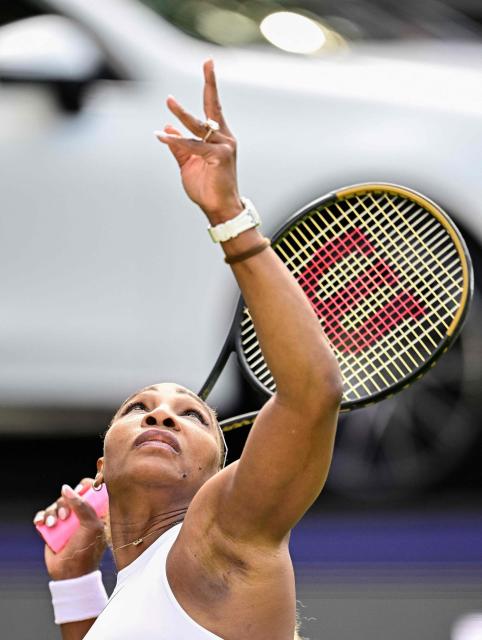 US tennis player Serena Williams serves the ball as she plays with Czech Republic's Karolina Muchova against New Zealand's Erin Routliffe and Mexico's Giuliana Olmos during the women's doubles round of 16 match at the WTA500 Berlin Tennis Open tournament in Berlin on June 16, 2026. (Photo by Tobias SCHWARZ / AFP)