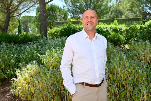 Director of Sanofi France and Managing Director Vaccines France Charles Wolf poses for a photograph during a press visit to the industrial site of the French pharmaceutical group Sanofi in Montpellier, southern France, on June 16, 2026. (Photo by Sylvain THOMAS / AFP)