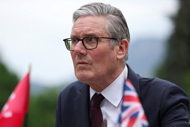 Britain's Prime Minister Keir Starmer looks on during a meeting with Switzerland's President on the sideline of the G7 summit, in Evian, eastern France, on June 16, 2026. A G7 summit is set to take place June 15 to 17 in the French town of Evian-les-Bains near Switzerland and it will be attended by country leaders as well as the EU's foreign policy chief and ministers from Brazil, Canada, the United Arab Emirates and Turkey. (Photo by Isabel Infantes / POOL / AFP)