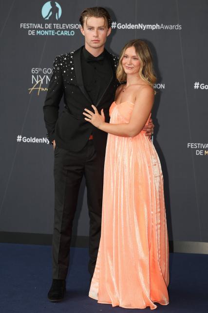 US model Morgan McDonough (L) and Kamryn Guthrie arrive for the closing ceremony of the 65th Monte-Carlo Television Festival in Monaco on June 16, 2026. (Photo by Valery HACHE / AFP)