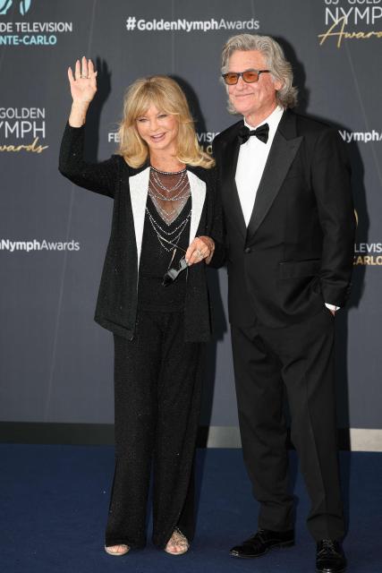 US actress Goldie Hawn and US actor Kurt Russell arrive for the closing ceremony of the 65th Monte-Carlo Television Festival in Monaco on June 16, 2026. (Photo by Valery HACHE / AFP)