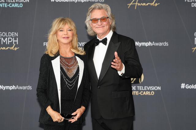 US actress Goldie Hawn and US actor Kurt Russell arrive for the closing ceremony of the 65th Monte-Carlo Television Festival in Monaco on June 16, 2026. (Photo by Valery HACHE / AFP)