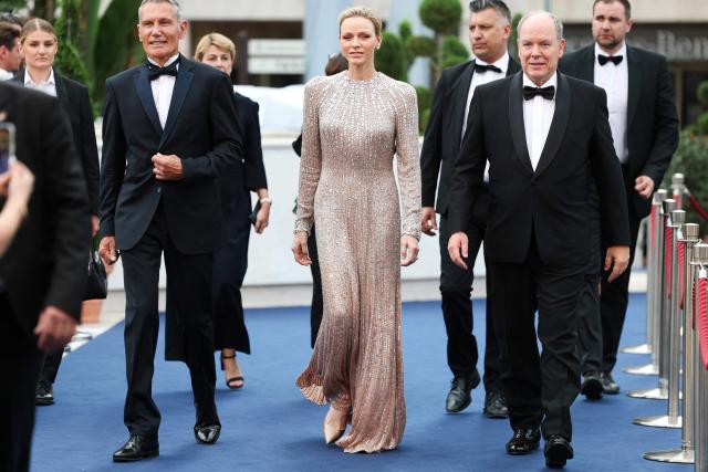 Princess Charlene of Monaco (C) and Prince's Albert II of Monaco (R) arrive for the closing ceremony of the 65th Monte-Carlo Television Festival in Monaco on June 16, 2026. (Photo by Valery HACHE / AFP) / / NO TABLOIDS WEB & PRINT, NO DAILY MAIL, NO DAILY MAIL GROUP, NO VOICI, NO CLOSER