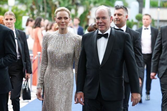 Princess Charlene of Monaco (C) and Prince's Albert II of Monaco arrive for the closing ceremony of the 65th Monte-Carlo Television Festival in Monaco on June 16, 2026. (Photo by Valery HACHE / AFP) / / NO TABLOIDS WEB & PRINT, NO DAILY MAIL, NO DAILY MAIL GROUP, NO VOICI, NO CLOSER