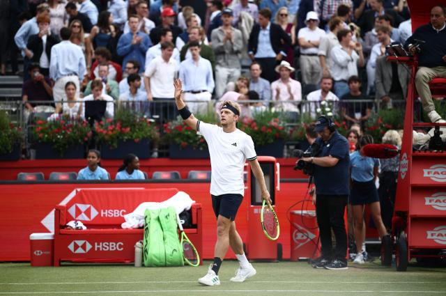 Spain's Alejandro Davidovich Fokina celebrates winning against Britain's Cameron Norrie after winning their men's singles round of 32 tennis match on day two of the ATP HSBC Championships at Queen's Club in west London on June 16, 2026. (Photo by Henry NICHOLLS / AFP)