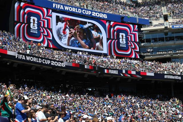 Fans cheer ahead of the 2026 World Cup Group I football match between France and Senegal at the New York/New Jersey Stadium in East Rutherford on June 16, 2026.  (Photo by FRANCK FIFE / AFP)