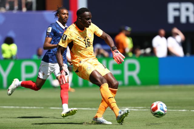 Senegal's goalkeeper #16 Edouard Mendy clears the ball during the 2026 World Cup Group I football match between France and Senegal at the New York/New Jersey Stadium in East Rutherford on June 16, 2026.  (Photo by FRANCK FIFE / AFP)