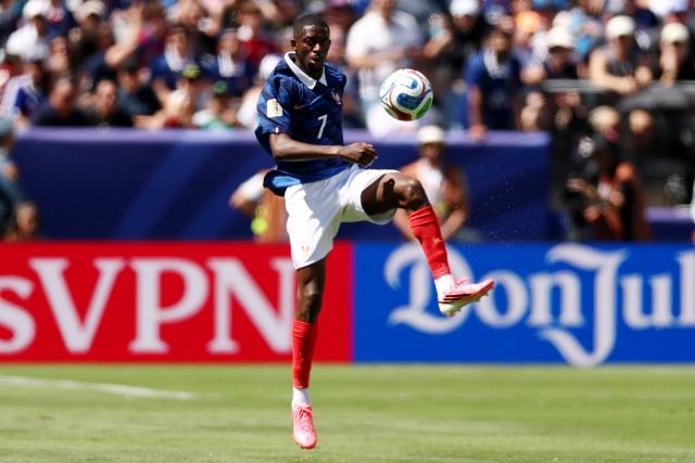 France's forward #07 Ousmane Dembele controls the ball during the 2026 World Cup Group I football match between France and Senegal at the New York/New Jersey Stadium in East Rutherford on June 16, 2026.  (Photo by CHARLY TRIBALLEAU / AFP)
