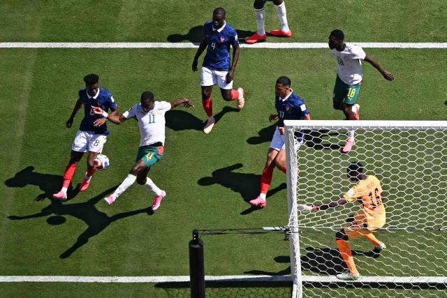 France's midfielder #08 Aurelien Tchouameni (L) and Senegal's forward #11 Nicolas Jackson (2nd L) fight for the ball during of the 2026 World Cup Group I football match between France and Senegal at the New York/New Jersey Stadium in East Rutherford on June 16, 2026. (Photo by Jewel SAMAD / AFP)