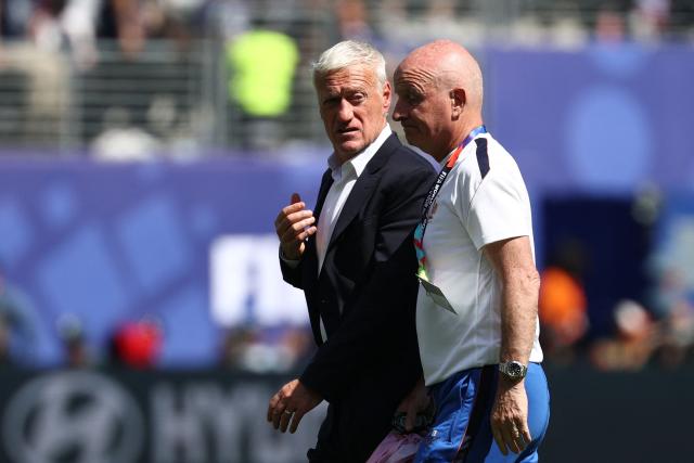 France's head coach Didier Deschamps talks to his assistant Guy Stephan at half time during the 2026 World Cup Group I football match between France and Senegal at the New York/New Jersey Stadium in East Rutherford on June 16, 2026.  (Photo by FRANCK FIFE / AFP)