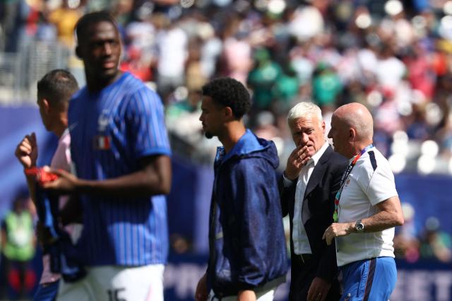 France's head coach Didier Deschamps talks to his assistant Guy Stephan at half time during the 2026 World Cup Group I football match between France and Senegal at the New York/New Jersey Stadium in East Rutherford on June 16, 2026.  (Photo by FRANCK FIFE / AFP)