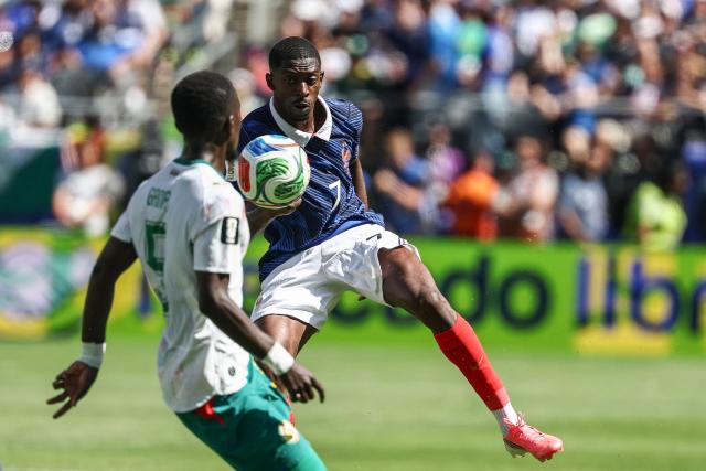 France's forward #07 Ousmane Dembele and Senegal's midfielder #05 Idrissa Gana Gueye fight for the ball during the 2026 World Cup Group I football match between France and Senegal at the New York/New Jersey Stadium in East Rutherford on June 16, 2026.  (Photo by FRANCK FIFE / AFP)