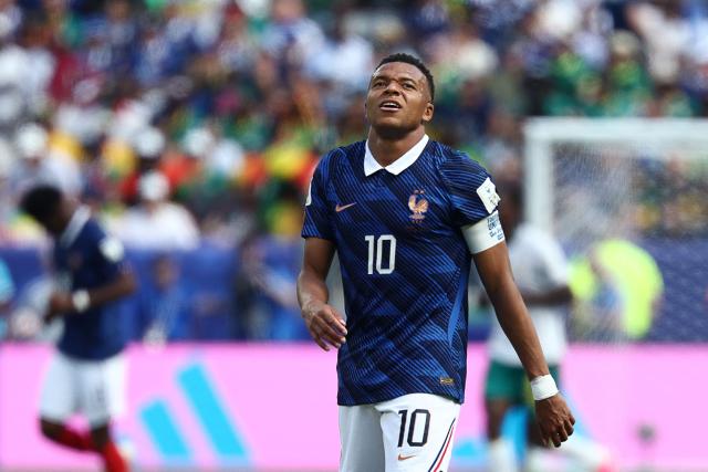 France's forward #10 Kylian Mbappe reacts during the 2026 World Cup Group I football match between France and Senegal at the New York/New Jersey Stadium in East Rutherford on June 16, 2026.  (Photo by FRANCK FIFE / AFP)