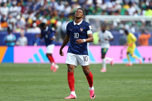 France's forward #10 Kylian Mbappe reacts during the 2026 World Cup Group I football match between France and Senegal at the New York/New Jersey Stadium in East Rutherford on June 16, 2026.  (Photo by FRANCK FIFE / AFP)