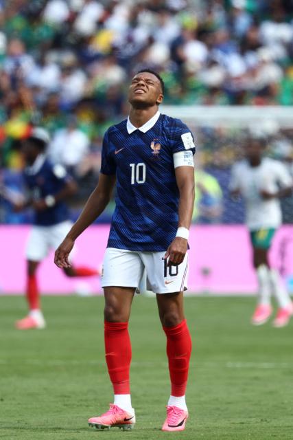France's forward #10 Kylian Mbappe reacts during the 2026 World Cup Group I football match between France and Senegal at the New York/New Jersey Stadium in East Rutherford on June 16, 2026.  (Photo by FRANCK FIFE / AFP)