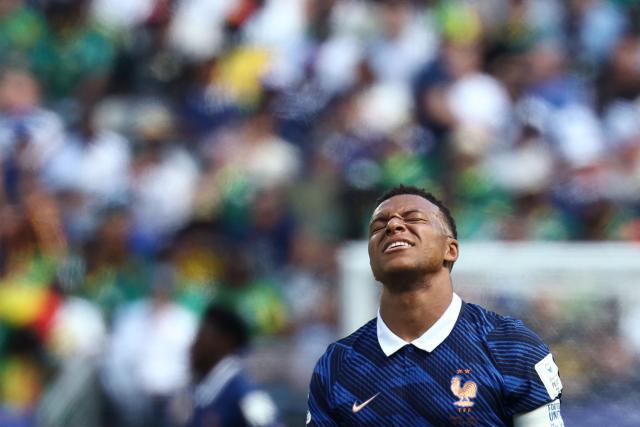 France's forward #10 Kylian Mbappe reacts during the 2026 World Cup Group I football match between France and Senegal at the New York/New Jersey Stadium in East Rutherford on June 16, 2026.  (Photo by FRANCK FIFE / AFP)