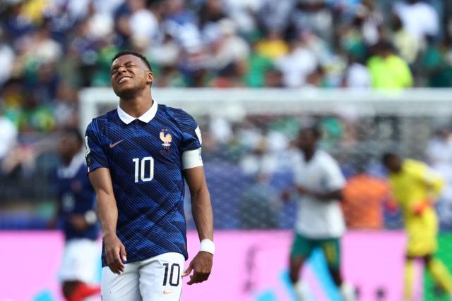 France's forward #10 Kylian Mbappe reacts during the 2026 World Cup Group I football match between France and Senegal at the New York/New Jersey Stadium in East Rutherford on June 16, 2026.  (Photo by FRANCK FIFE / AFP)