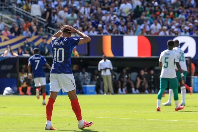 France's forward #10 Kylian Mbappe reacts during the 2026 World Cup Group I football match between France and Senegal at the New York/New Jersey Stadium in East Rutherford on June 16, 2026.  (Photo by TIMOTHY A. CLARY / AFP)