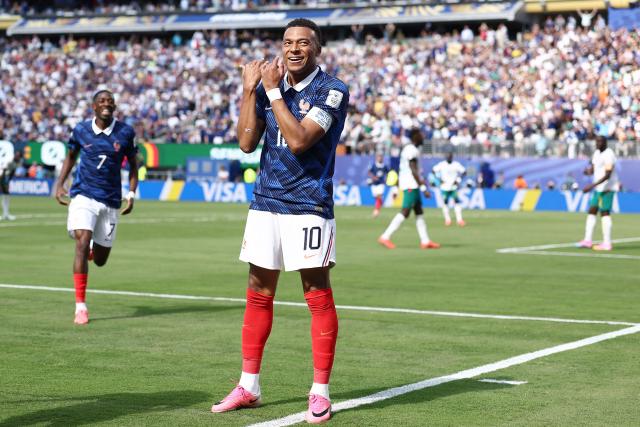 France's forward #10 Kylian Mbappe celebrates after scoring his team's first goal during the 2026 World Cup Group I football match between France and Senegal at the New York/New Jersey Stadium in East Rutherford on June 16, 2026.  (Photo by CHARLY TRIBALLEAU / AFP)