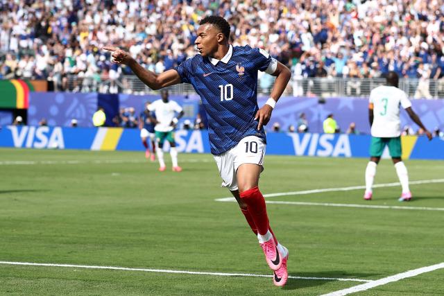 France's forward #10 Kylian Mbappe celebrates after scoring his team's first goal during the 2026 World Cup Group I football match between France and Senegal at the New York/New Jersey Stadium in East Rutherford on June 16, 2026.  (Photo by CHARLY TRIBALLEAU / AFP)