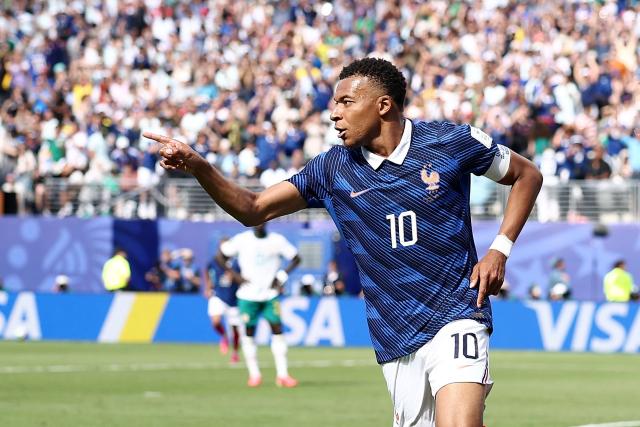 France's forward #10 Kylian Mbappe celebrates after scoring his team's first goal during the 2026 World Cup Group I football match between France and Senegal at the New York/New Jersey Stadium in East Rutherford on June 16, 2026.  (Photo by CHARLY TRIBALLEAU / AFP)