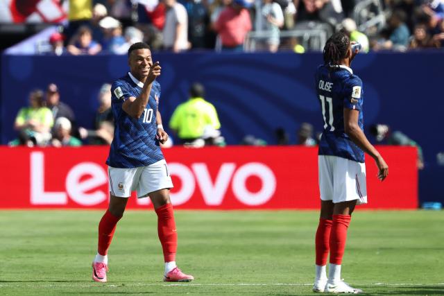 France's forward #10 Kylian Mbappe celebrates after scoring his team's first goal during the 2026 World Cup Group I football match between France and Senegal at the New York/New Jersey Stadium in East Rutherford on June 16, 2026.  (Photo by FRANCK FIFE / AFP)