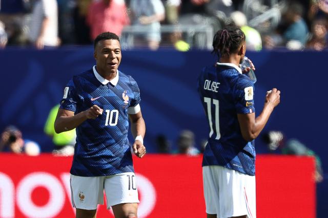 France's forward #10 Kylian Mbappe celebrates after scoring his team's first goal during the 2026 World Cup Group I football match between France and Senegal at the New York/New Jersey Stadium in East Rutherford on June 16, 2026.  (Photo by FRANCK FIFE / AFP)