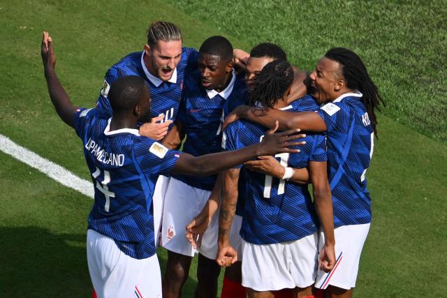 France's forward #10 Kylian Mbappe (C) celebrates scoring his team's first goal with teammates during the 2026 World Cup Group I football match between France and Senegal at the New York/New Jersey Stadium in East Rutherford on June 16, 2026. (Photo by Angela WEISS / AFP)