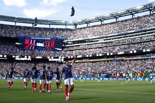 France's forward #10 Kylian Mbappe celebrates after scoring his team's first goal during the 2026 World Cup Group I football match between France and Senegal at the New York/New Jersey Stadium in East Rutherford on June 16, 2026.  (Photo by CHARLY TRIBALLEAU / AFP)