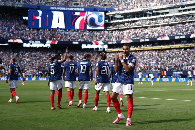 France's forward #10 Kylian Mbappe celebrates after scoring his team's first goal during the 2026 World Cup Group I football match between France and Senegal at the New York/New Jersey Stadium in East Rutherford on June 16, 2026.  (Photo by CHARLY TRIBALLEAU / AFP)